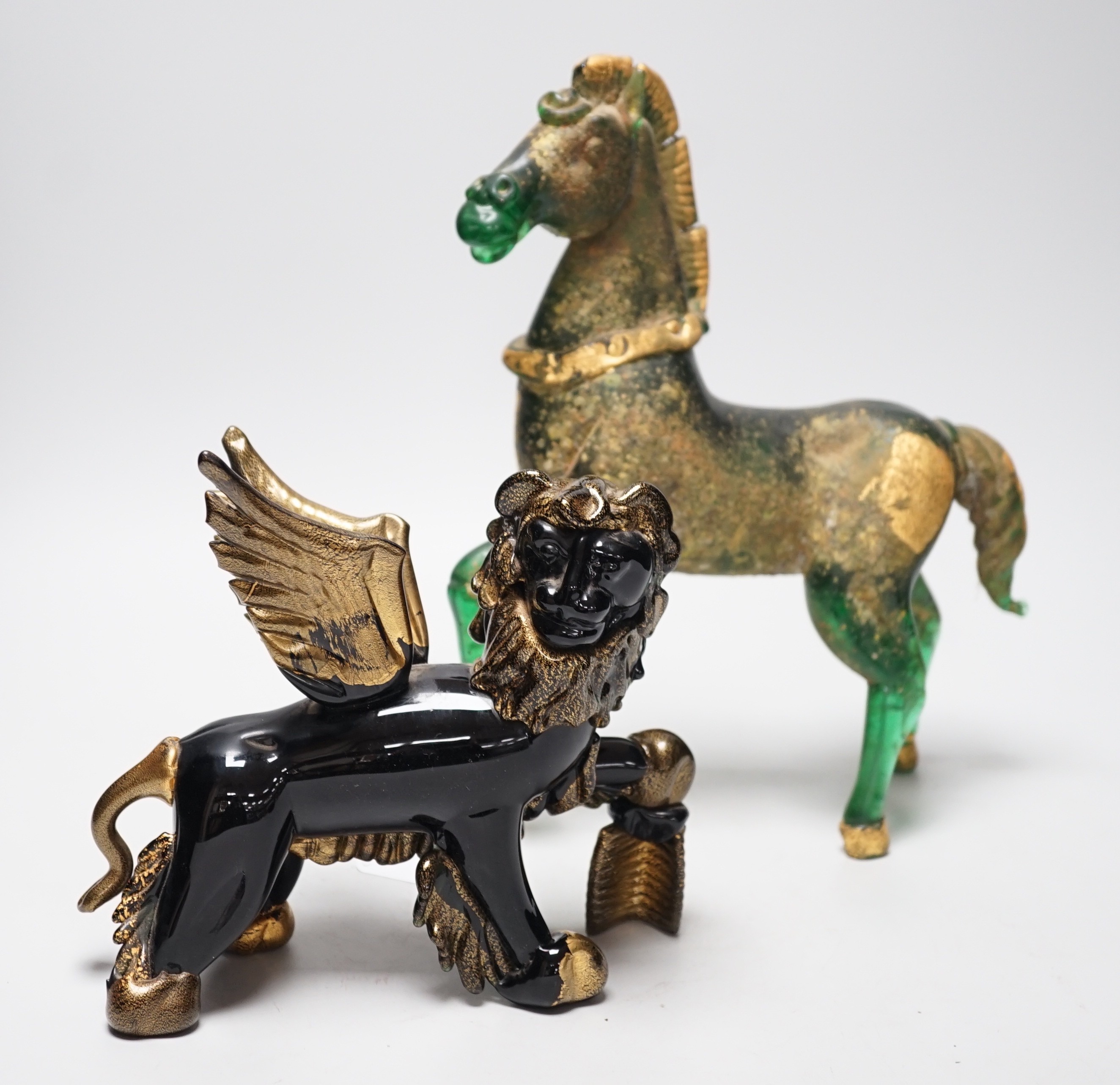 A Murano gilded glass model of the Lion of Venice, 21 cm long and a gilded green glass figure of a horse, 31cm